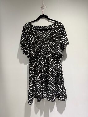 Black & White Polka Dot Ruffle Mini Dress | Flowy V-Neck Flutter Sleeve